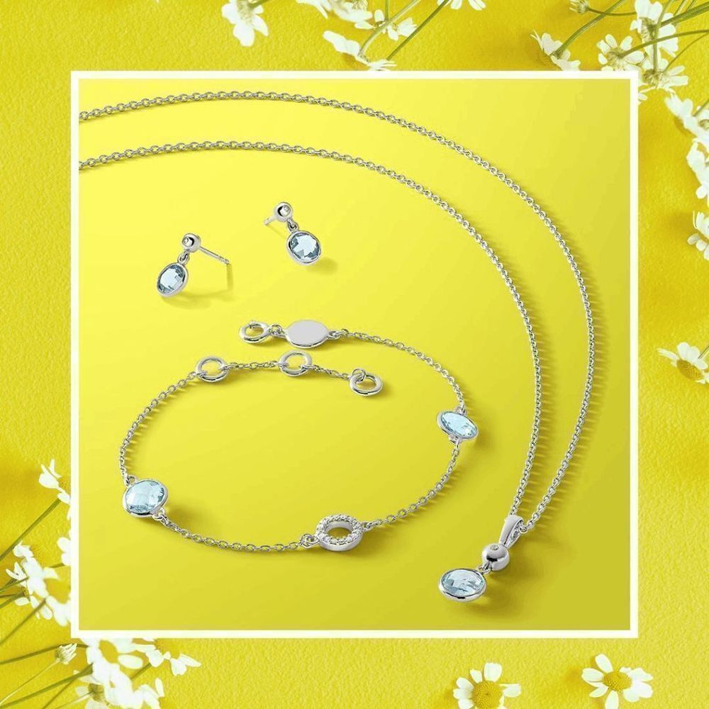 Sterling Silver Blue Topaz and Diamond Necklace, Bracelet and Earring Set